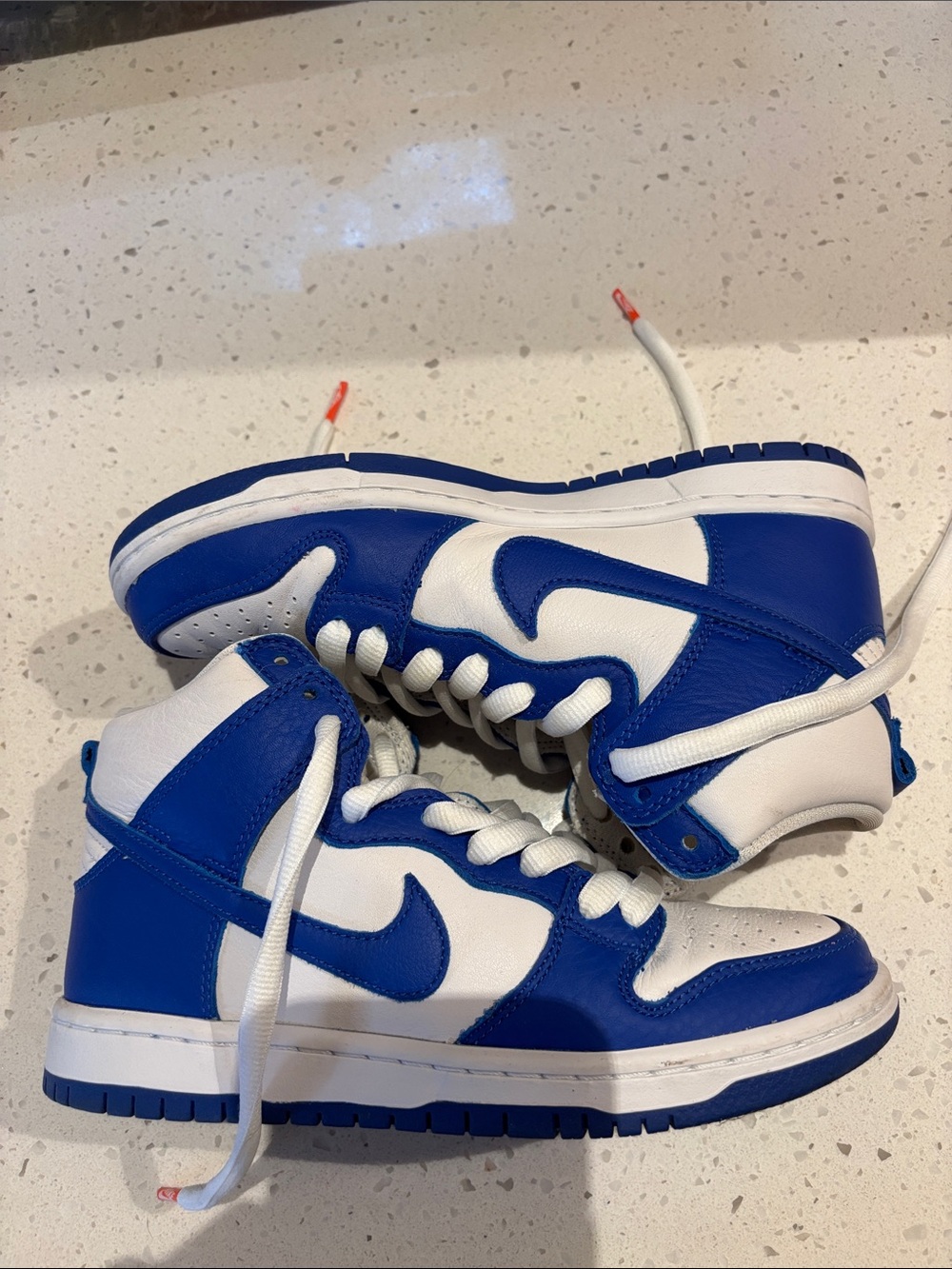 Nike men’s Blue and White High-Top Sneakers